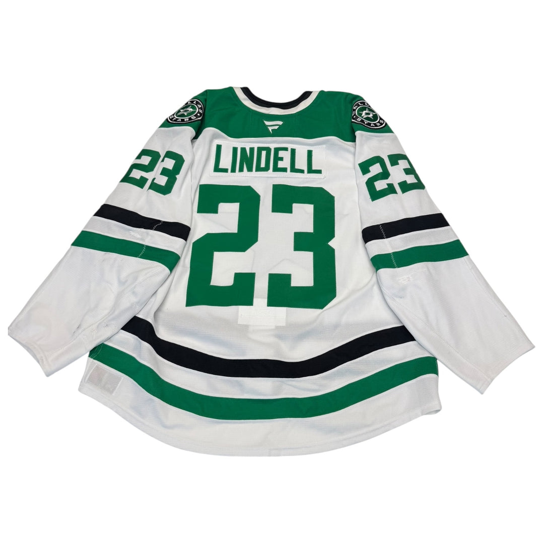 Game worn Dallas stars away jersey with number 23 and name 'Lindell' on a white background