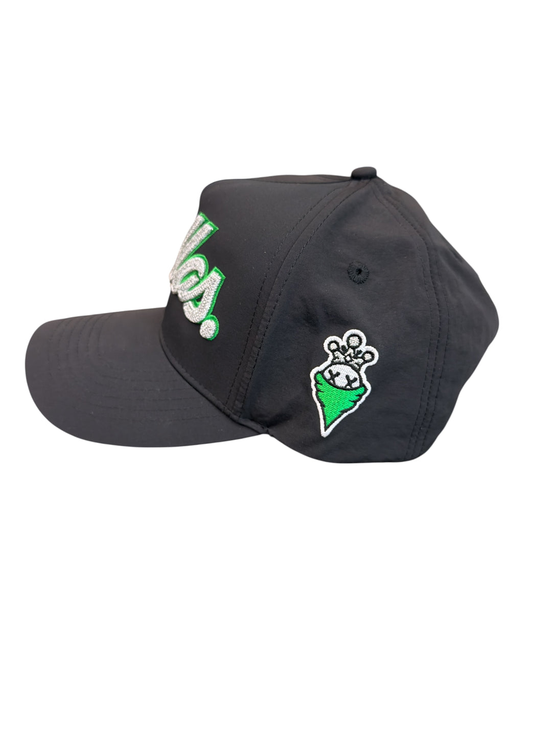 Black cap with green and white designs on a white background