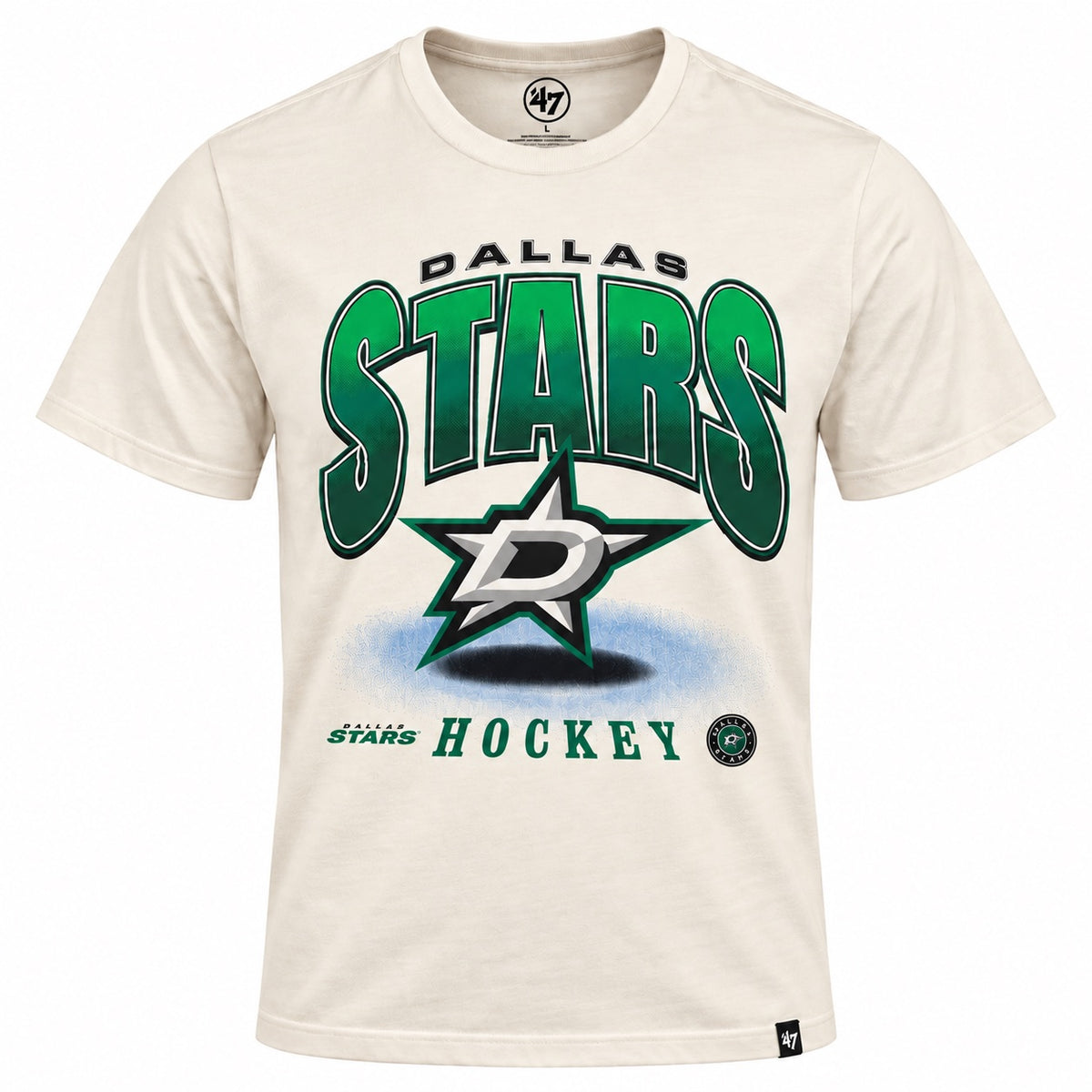 Cream-colored short-sleeve Dallas Stars T-shirt featuring large green-and-black “STARS” lettering with “DALLAS” above. A large Dallas Stars logo is centered over a blue shadow effect, with green “HOCKEY” lettering and smaller Dallas Stars graphics along the bottom. White background.