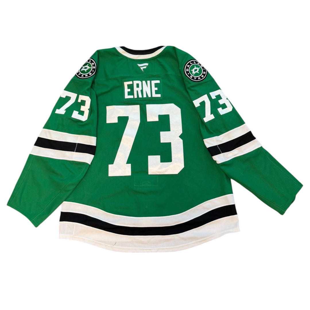 Game Worn Dallas Stars home hockey jersey with number 73 and name 'Erne' on a white background