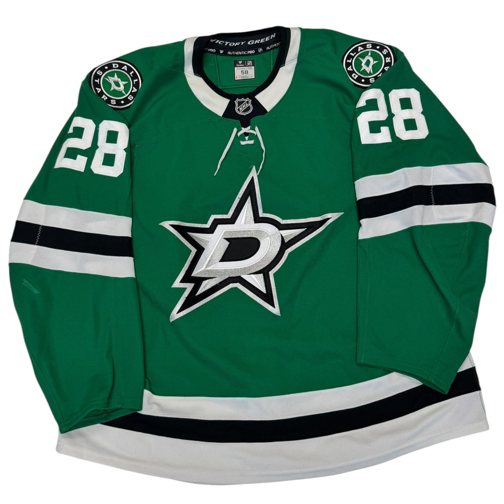 Green hockey jersey with number 28 and Dallas Stars logo on a white background