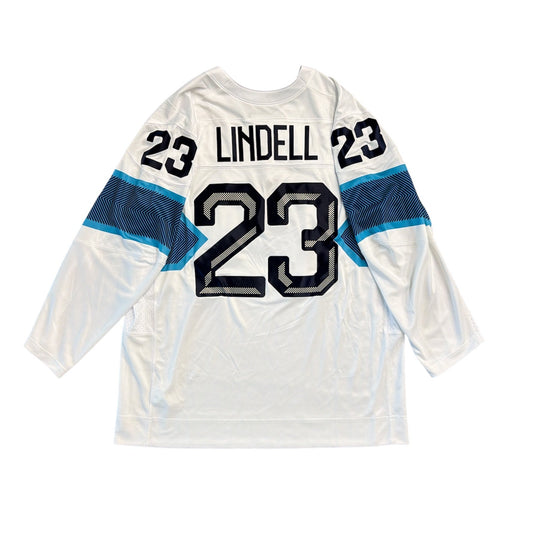 White hockey jersey with blue accents and 'Lindell' and number '23' on a white background