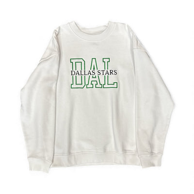 White sweatshirt with 'Dallas Stars' text in green on a white background