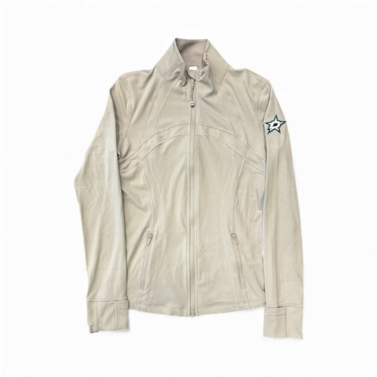 Beige jacket with a star patch on a white background