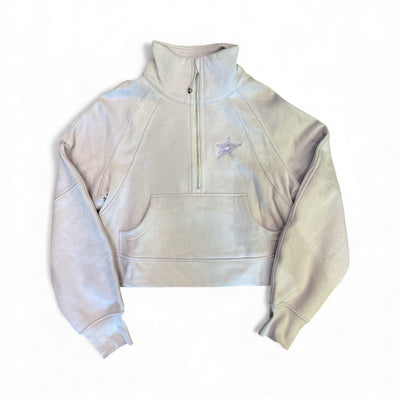 Lilac cropped hoodie with a Dallas Stars logo on a white background