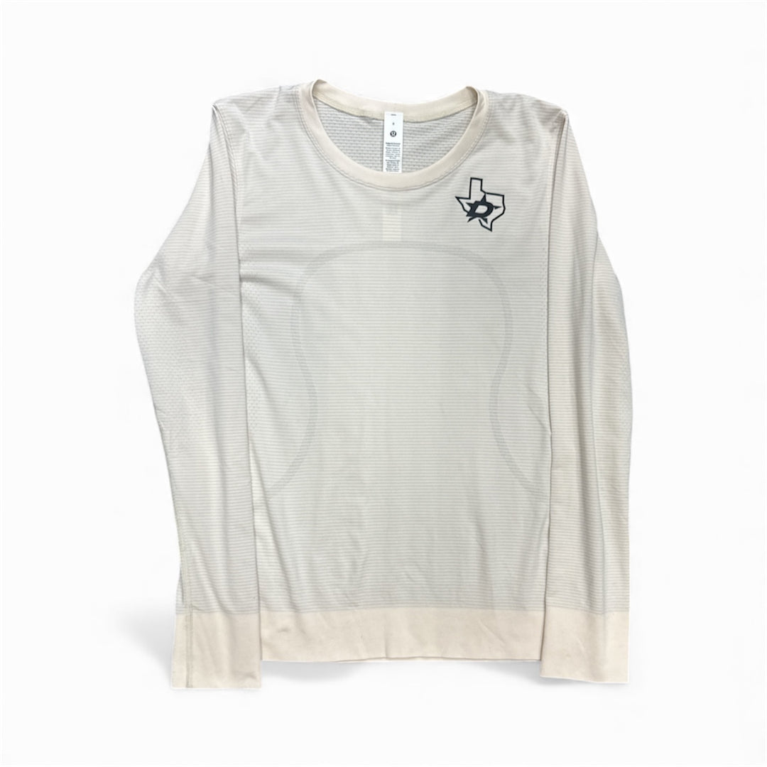 Light ivory long-sleeve shirt with Dallas Stars logo on a white background