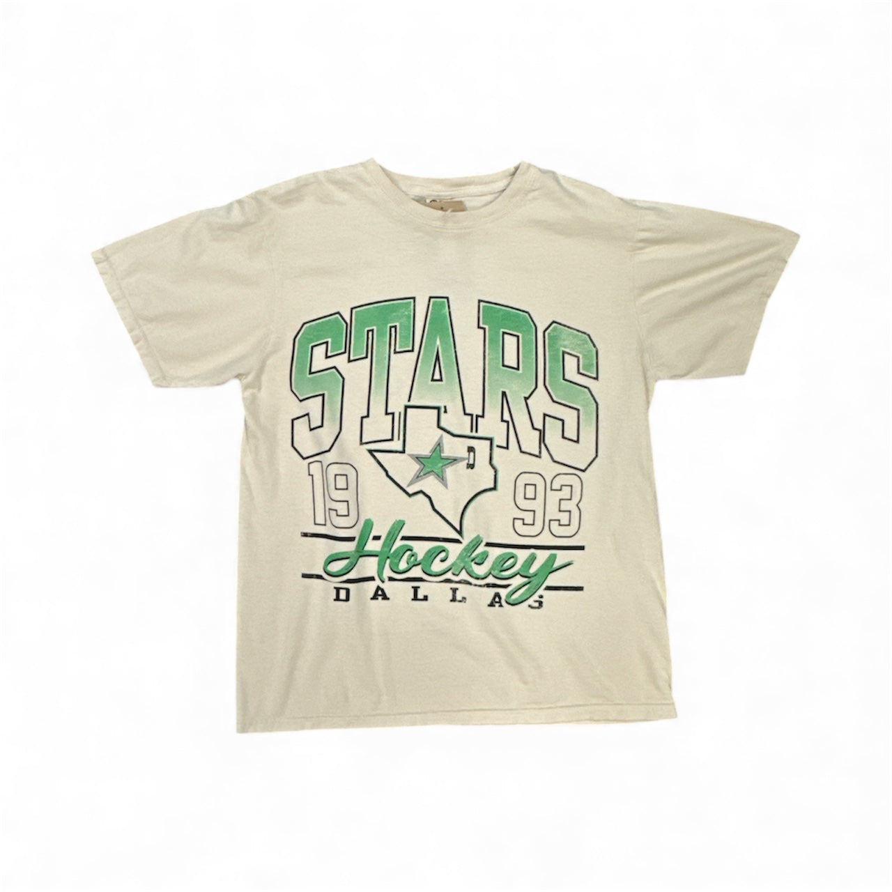 Beige t-shirt with 'Stars Hockey Dallas' graphic design on a white background