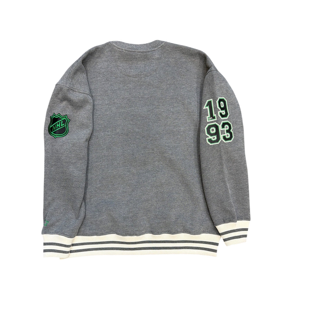 Grey sweatshirt with a logo and numbers on the sleeve against a white background