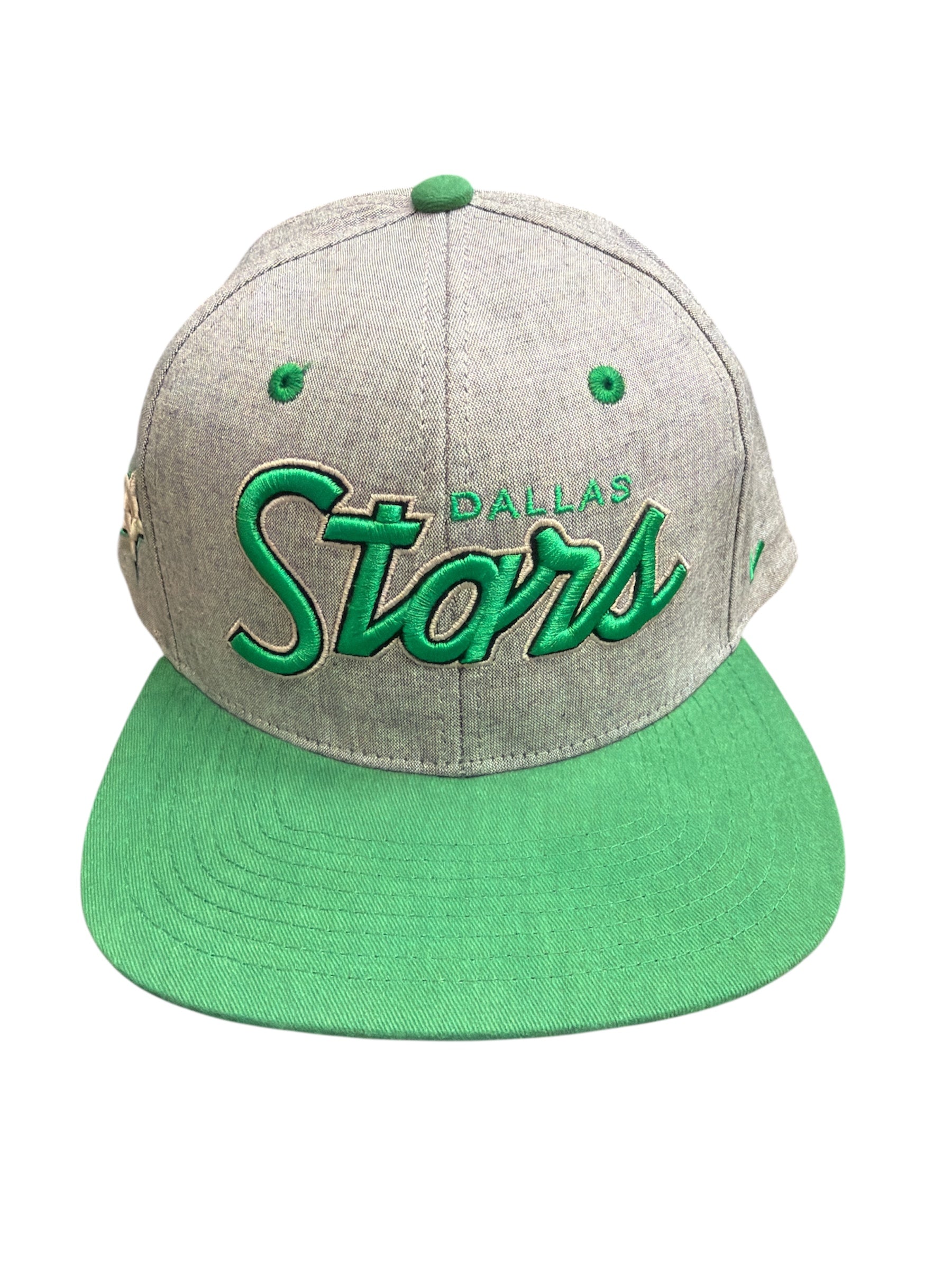 Gray and green cap with 'Dallas Stars' text on a white background