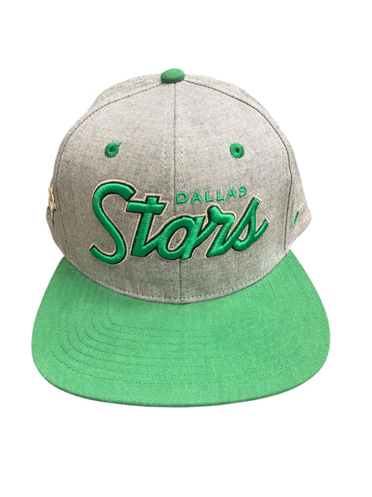 Gray and green cap with 'Dallas Stars' text on a white background
