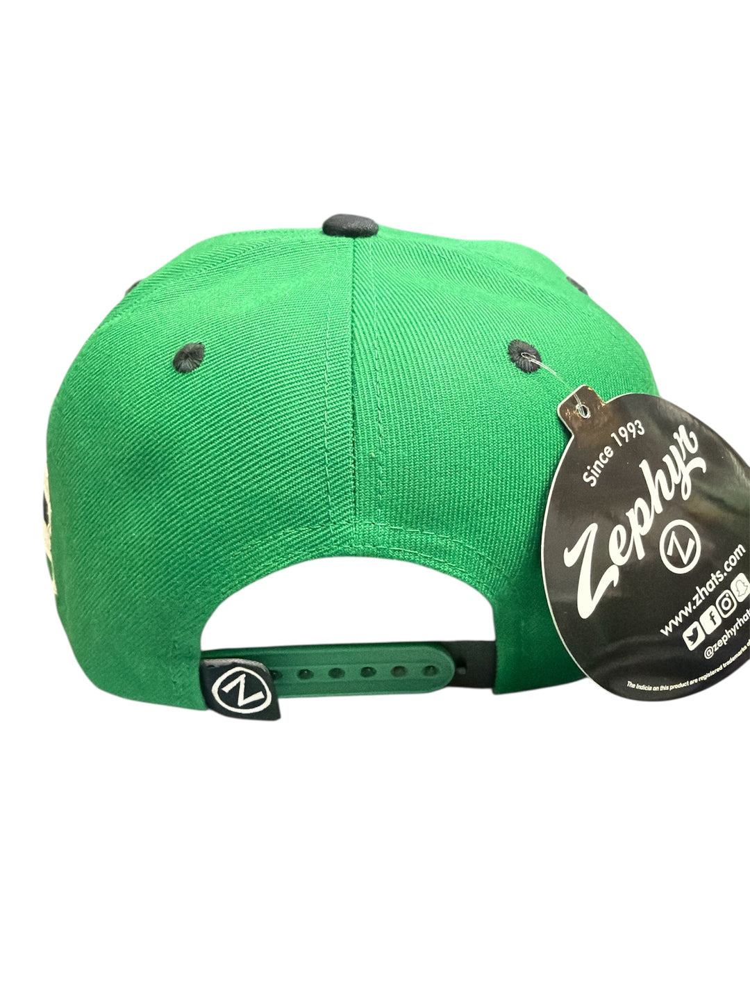 Green cap with a Zephyr brand tag on a white background