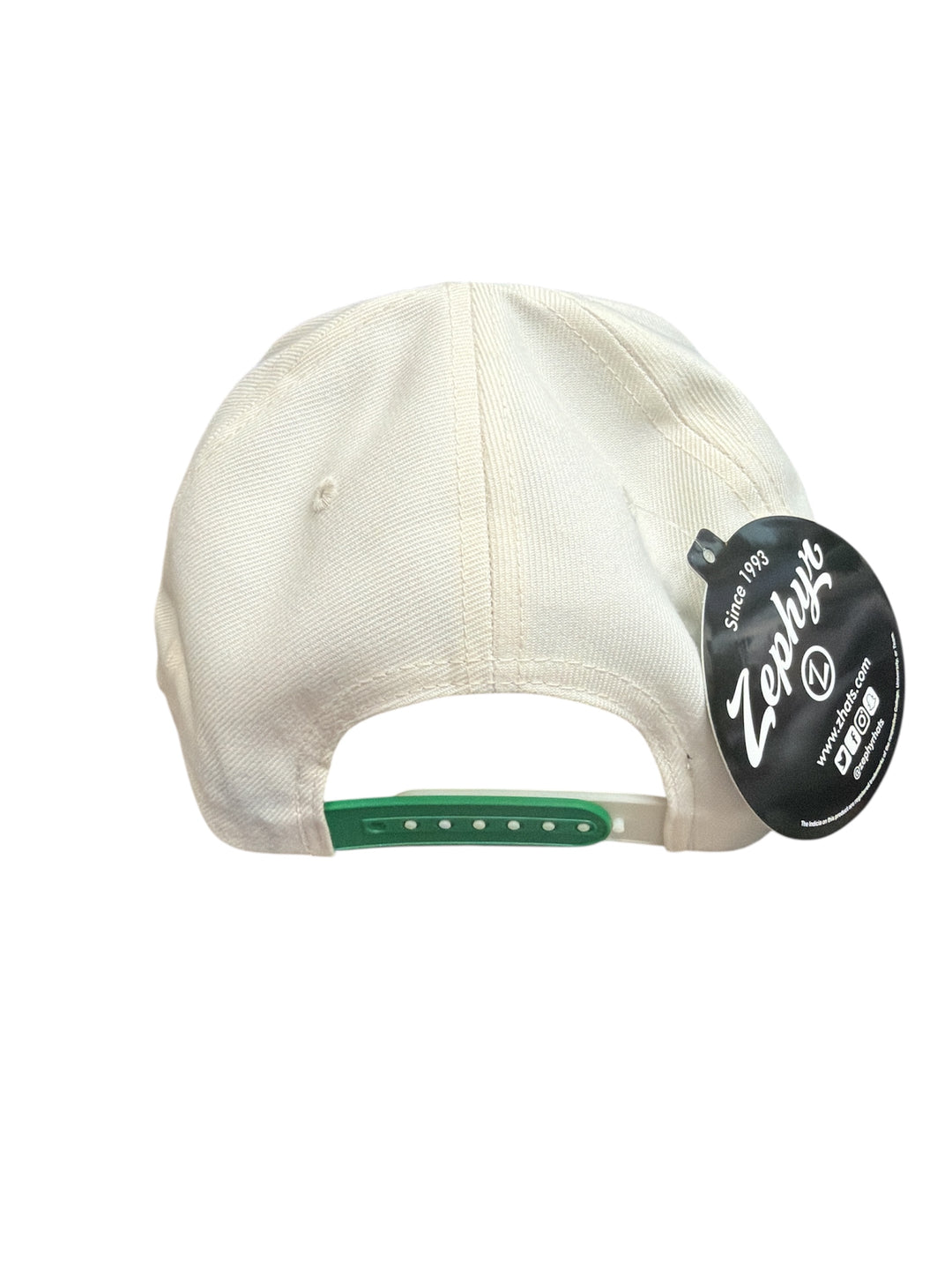 Beige cap with a brand tag on a white background