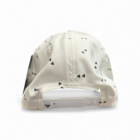 White cap with black triangle pattern on a white background