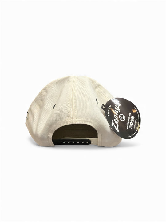 Beige cap with a brand tag on a white background