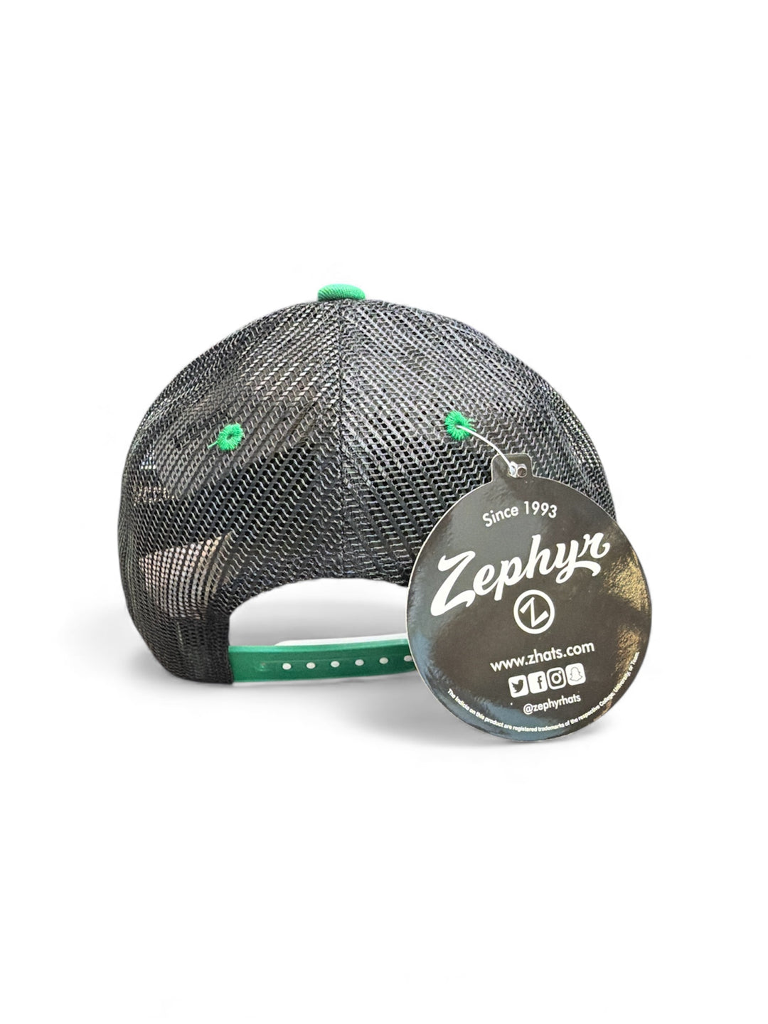 Black mesh youth cap with green accents and Zephyr logo on a white background