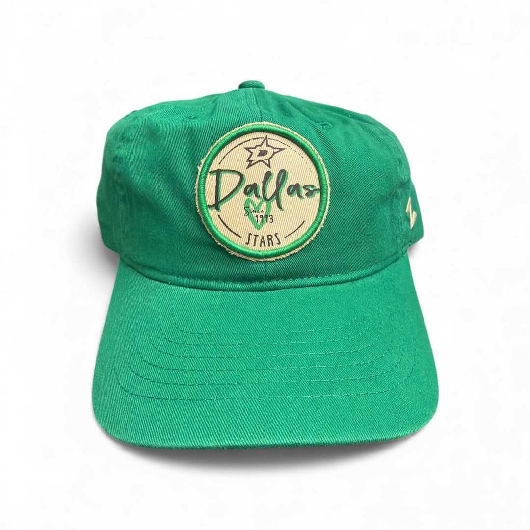 Womens green cap with a beige circular logo on a white background