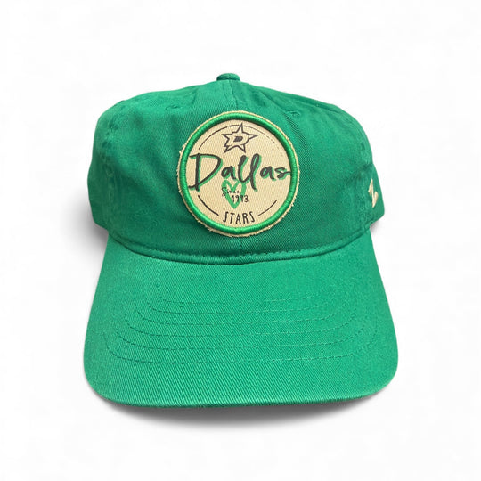 Womens green cap with a beige circular logo on a white background