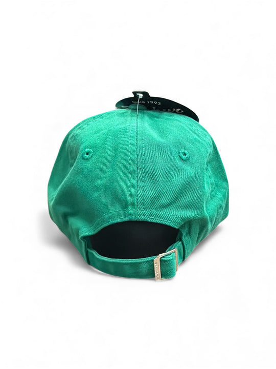 Green womens cap with a product tag on a white background