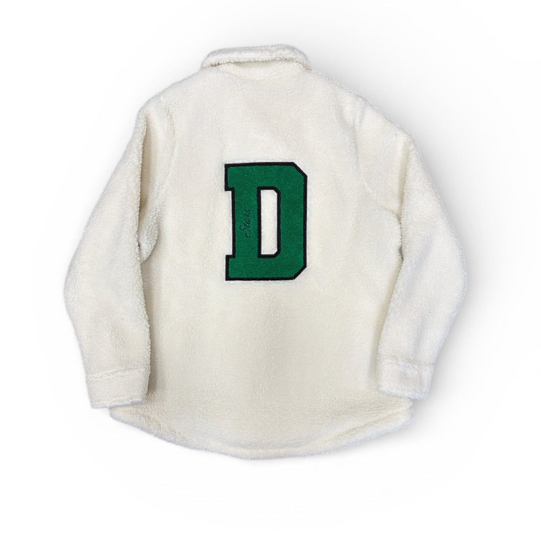 Cream jacket with a green letter 'D' on the back against a white background