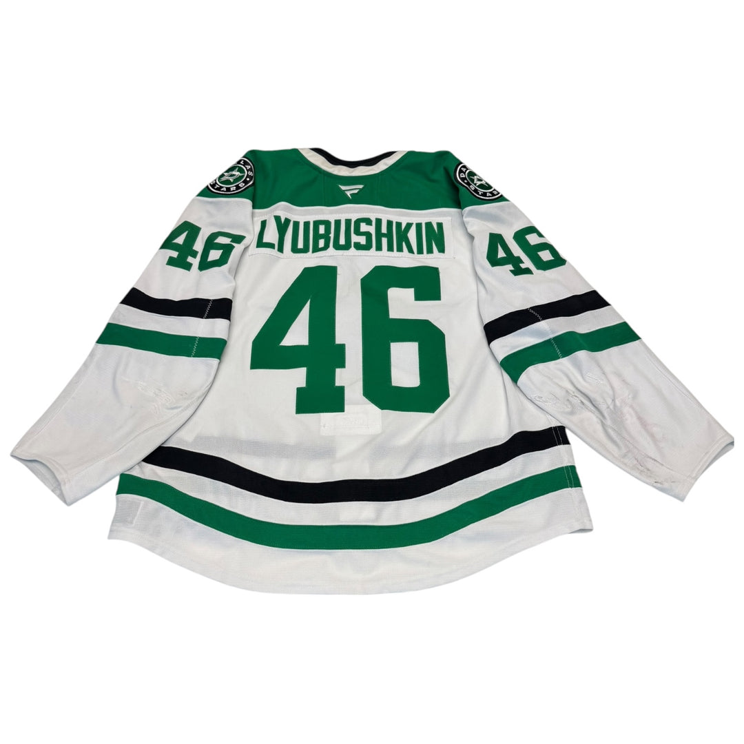 Game worn Dallas Stars away jersey with number 46 and name 'Lyubushkin' on a white background