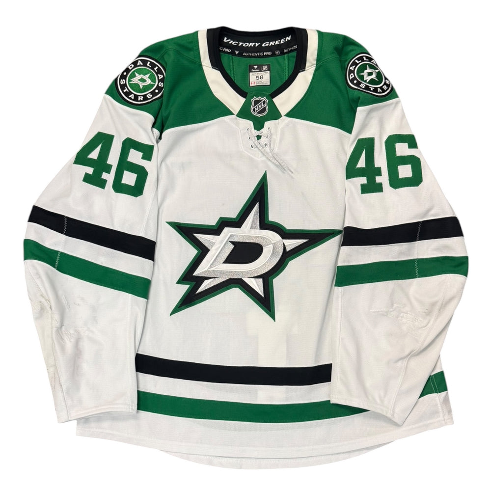 Game worn Dallas Stars Away jersey, number 46 on the sleeves with Dallas Stars logo on the chest. Hockey jersey on a white background
