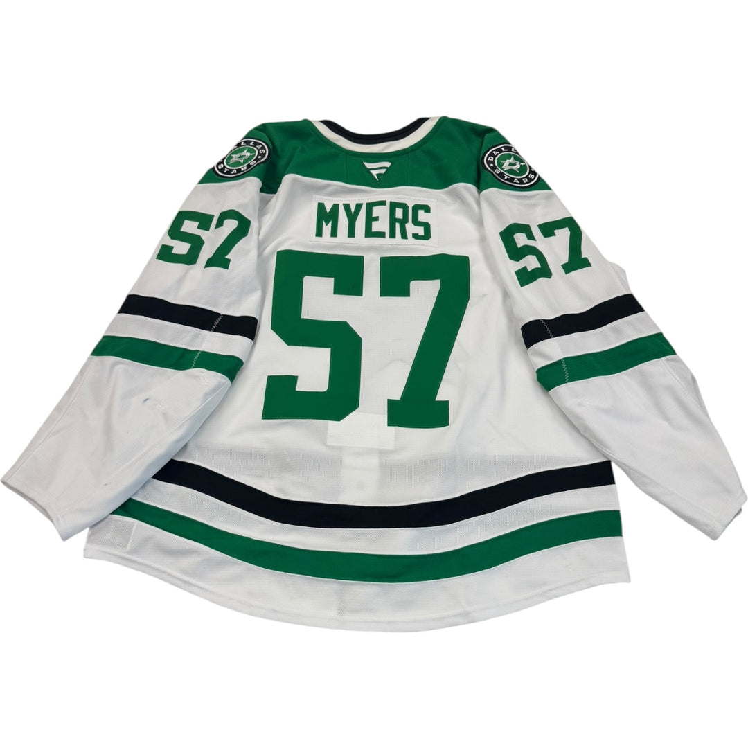 Game worn Dallas Stars away jersey with number 57 and name 'Myers'. Jersey on a white background