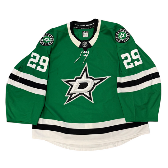 Game Worn Dallas Stars Home hockey jersey with number 29 on sleeves and Stars logo on chest with a white background