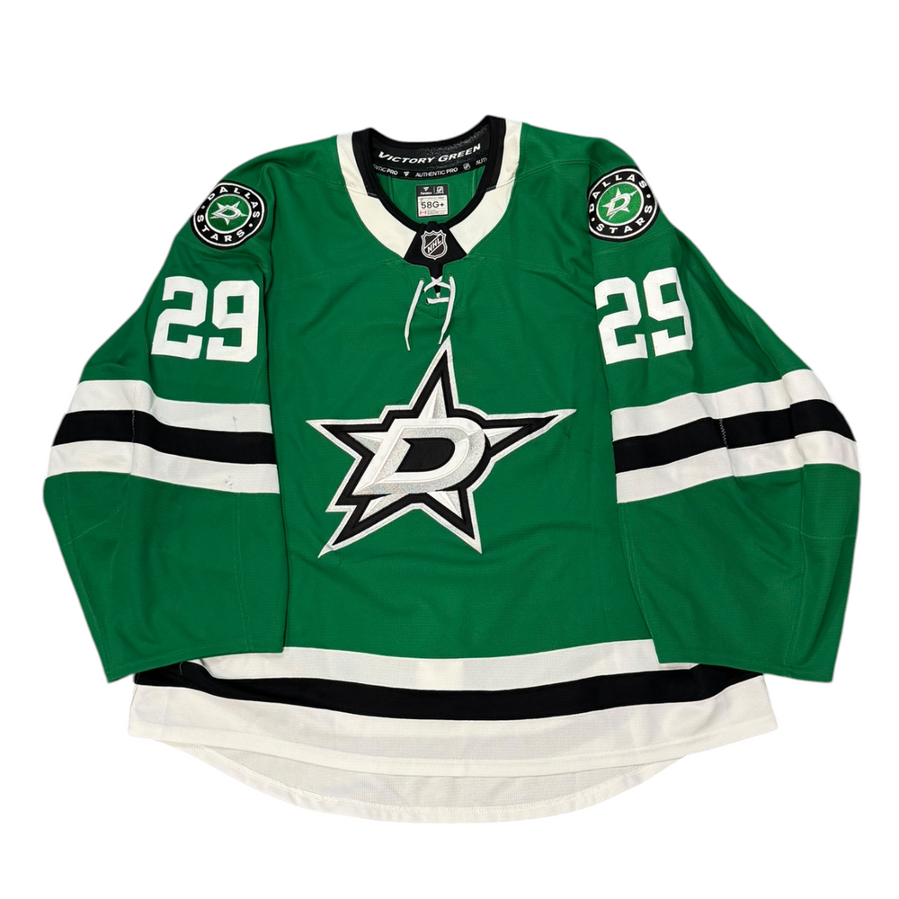 Game Worn Dallas Stars Home hockey jersey with number 29 on sleeves and Stars logo on chest with a white background