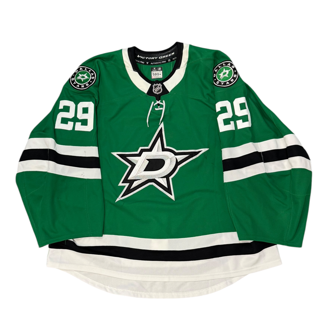 Game Worn Dallas Stars Home hockey jersey with number 29 on sleeves and Stars logo on chest with a white background