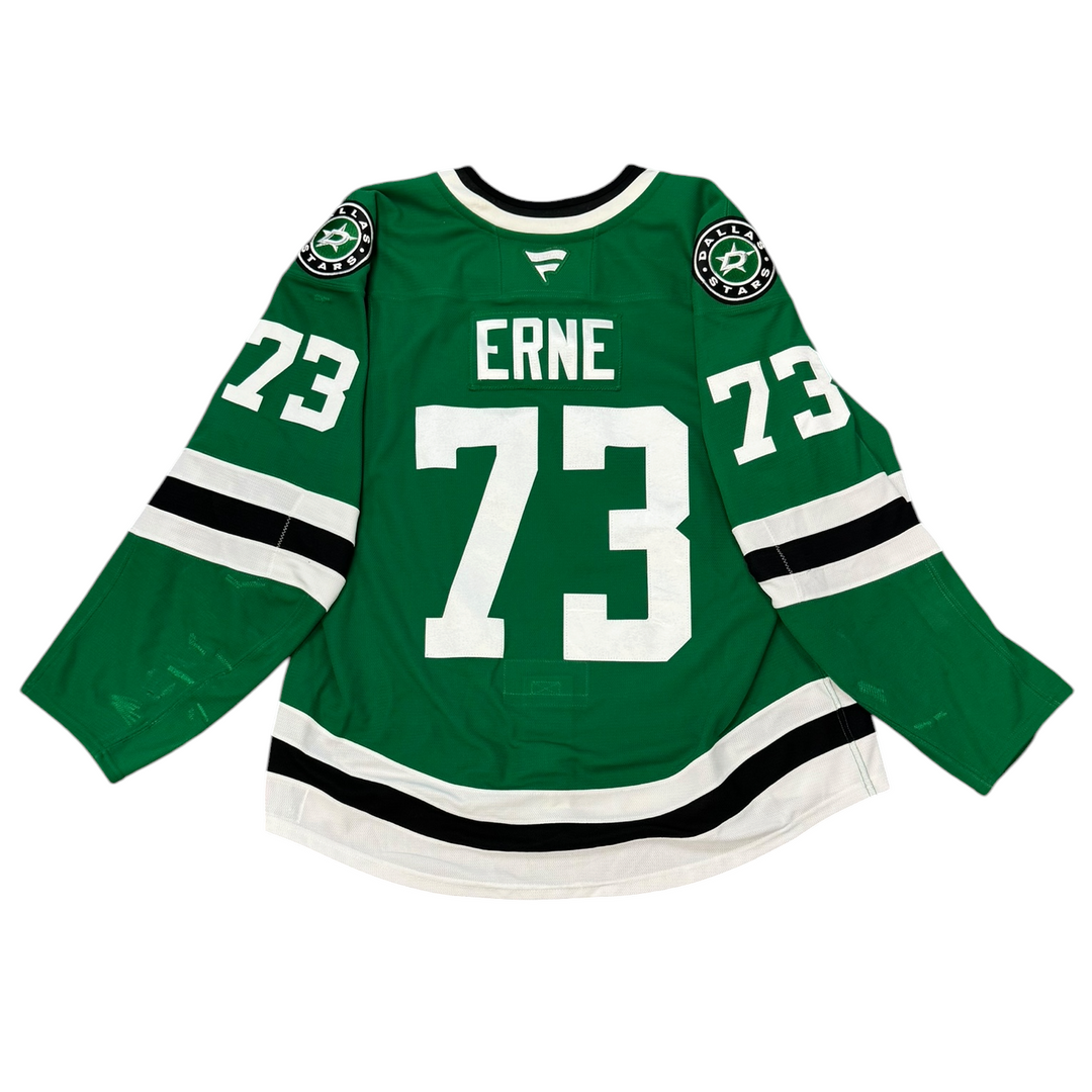Game Worn Dallas Stars Home hockey jersey with 'Erne' and number '73' on a white background