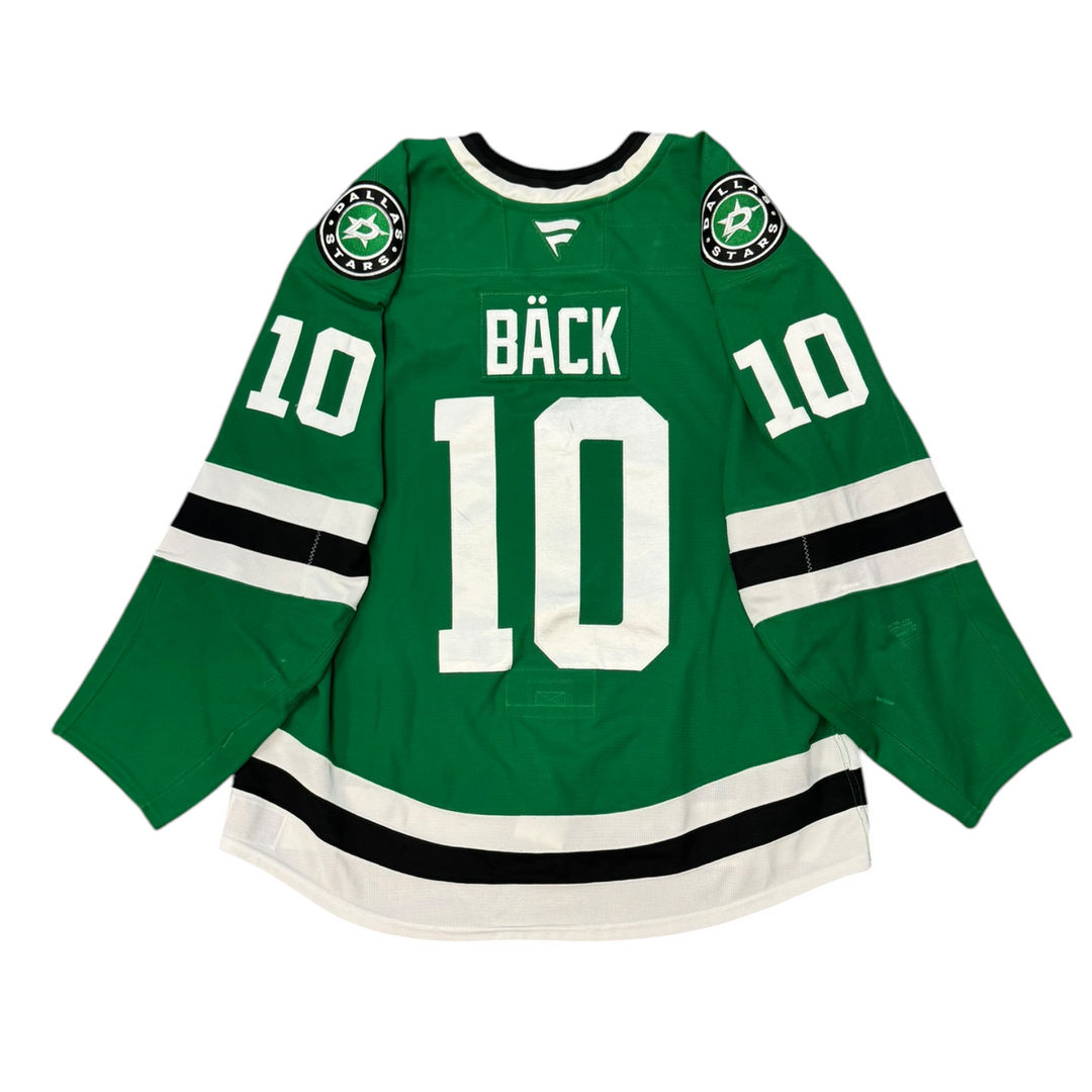 Game Worn Dallas Stars Home hockey jersey with number 10 and name Bäck on a white background