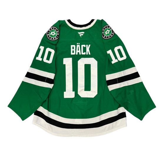 Game Worn Dallas Stars Home hockey jersey with number 10 and name Bäck on a white background