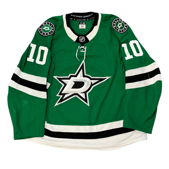 Game Worn Dallas Stars Home hockey jersey with number 10 on sleeves and Stars logo on chest with a white background