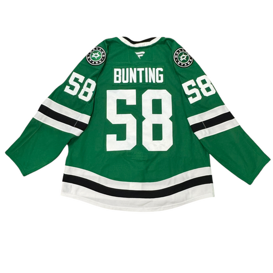 Game Worn Dallas Stars Home hockey jersey with number 58 on sleeves and Stars logo on chest with a white background