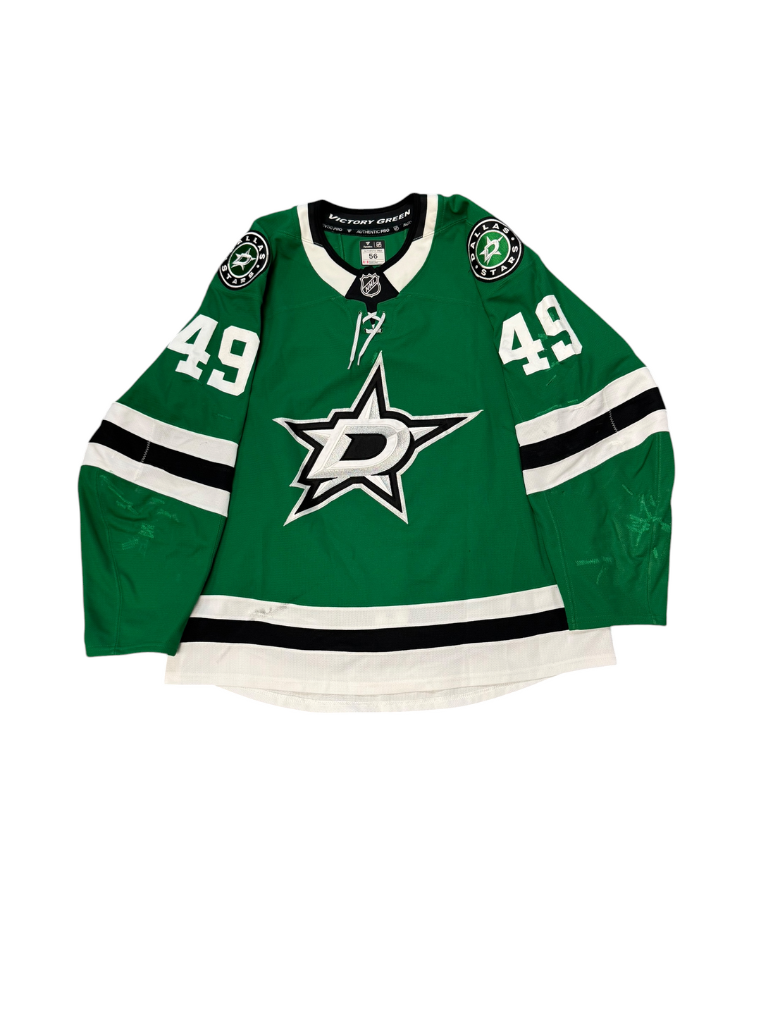 Game Worn Dallas Stars Home hockey jersey with number 49 on sleeves and Stars logo on chest with a white background