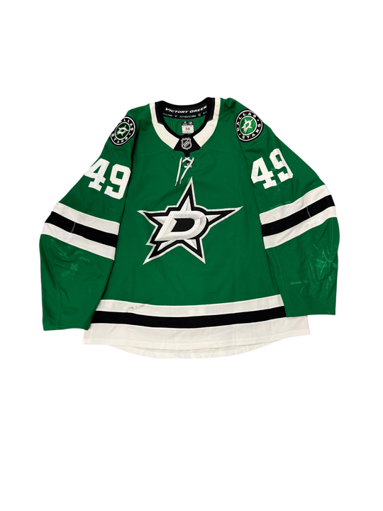 Game Worn Dallas Stars Home hockey jersey with number 49 on sleeves and Stars logo on chest with a white background