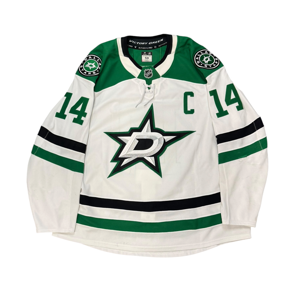 Game Worn Dallas Stars Away hockey jersey with number 14 on sleeves and Stars logo on chest. "C" on Chest 
Image with a white background