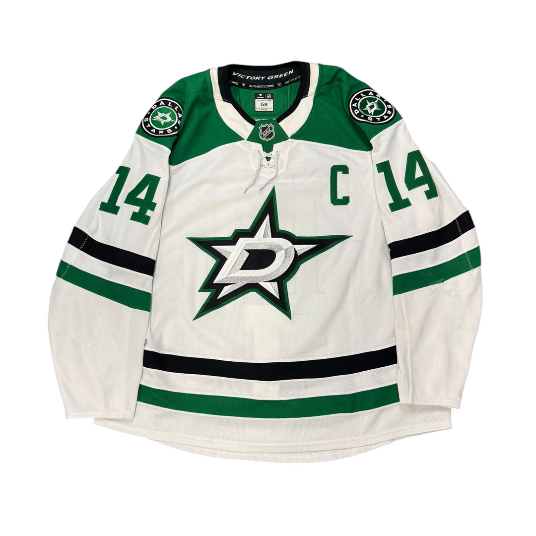 Game Worn Dallas Stars Away hockey jersey with number 14 on sleeves and Stars logo on chest. "C" on Chest 
Image with a white background