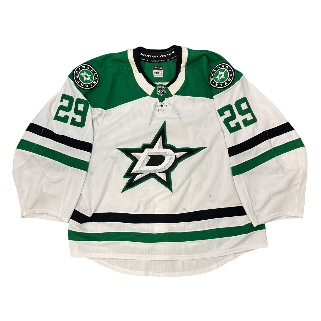 Game Worn Dallas Stars Away jersey with Stars logo on chest and number 29 on the sleeves. Jersey on a white background.
