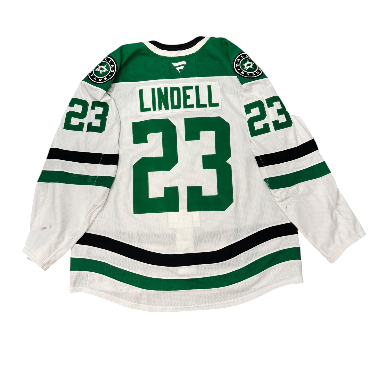 Game worn Dallas Stars away jersey with number 23 and name 'Lindell' on a white background