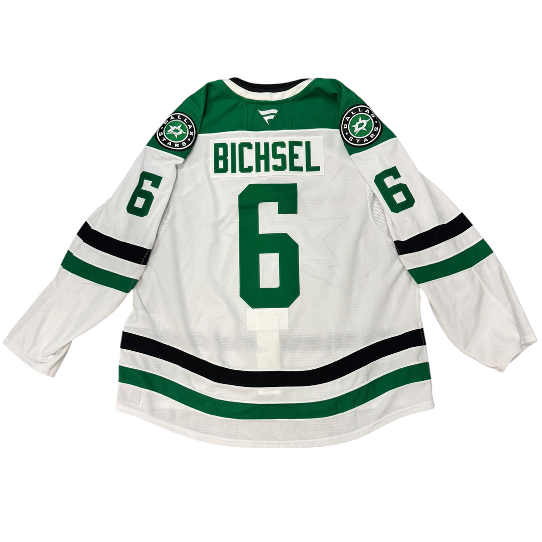 Game worn Dallas Stars away jersey with number 6 and name 'Bichsel' on a white background