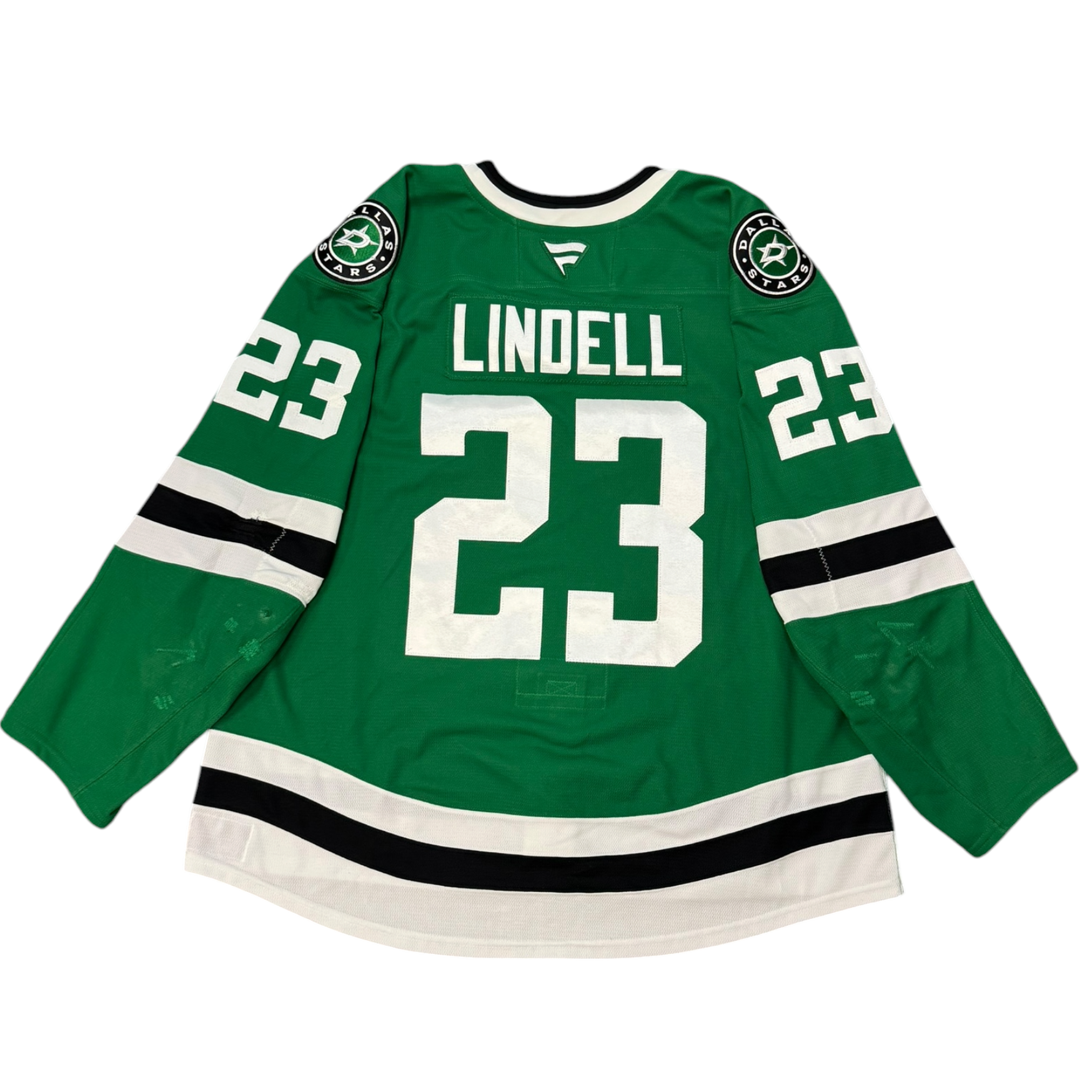 Game Worn Dallas Stars Home hockey jersey with number 23 and name 'Lindell' on a white background