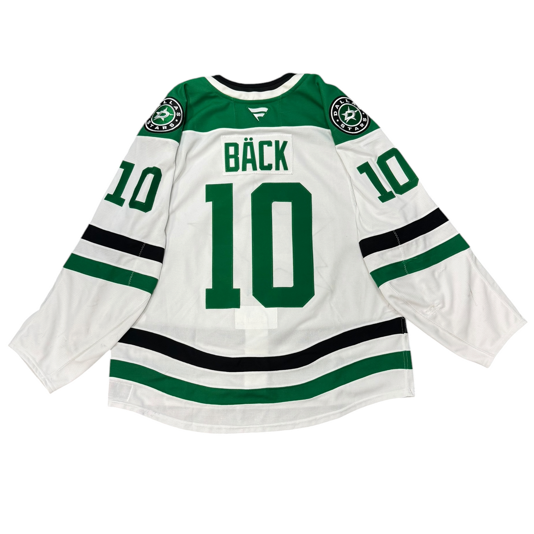 Game worn Dallas Stars away jersey with number 10 and name 'Bäck' on a white background
