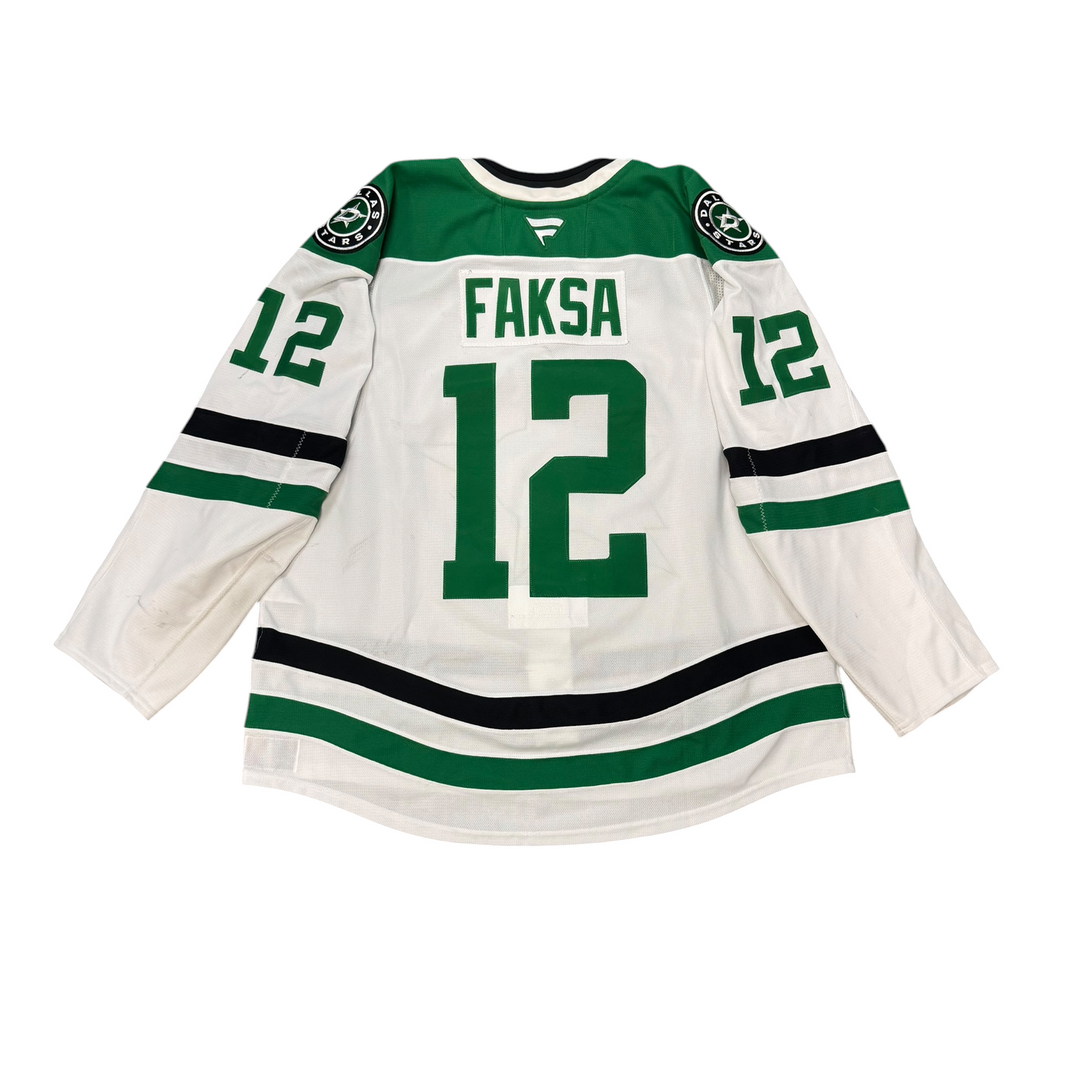 Game worn Dallas Stars away jersey with number 12 and name 'Faksa' on a white background