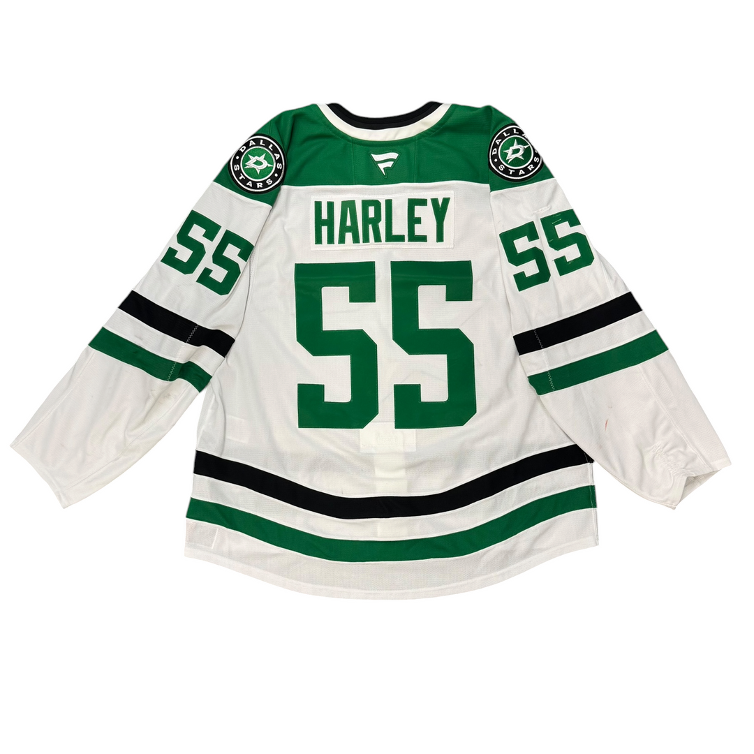 Game worn Dallas Stars away jersey with the name 'Harley' and number '55' on a white background
