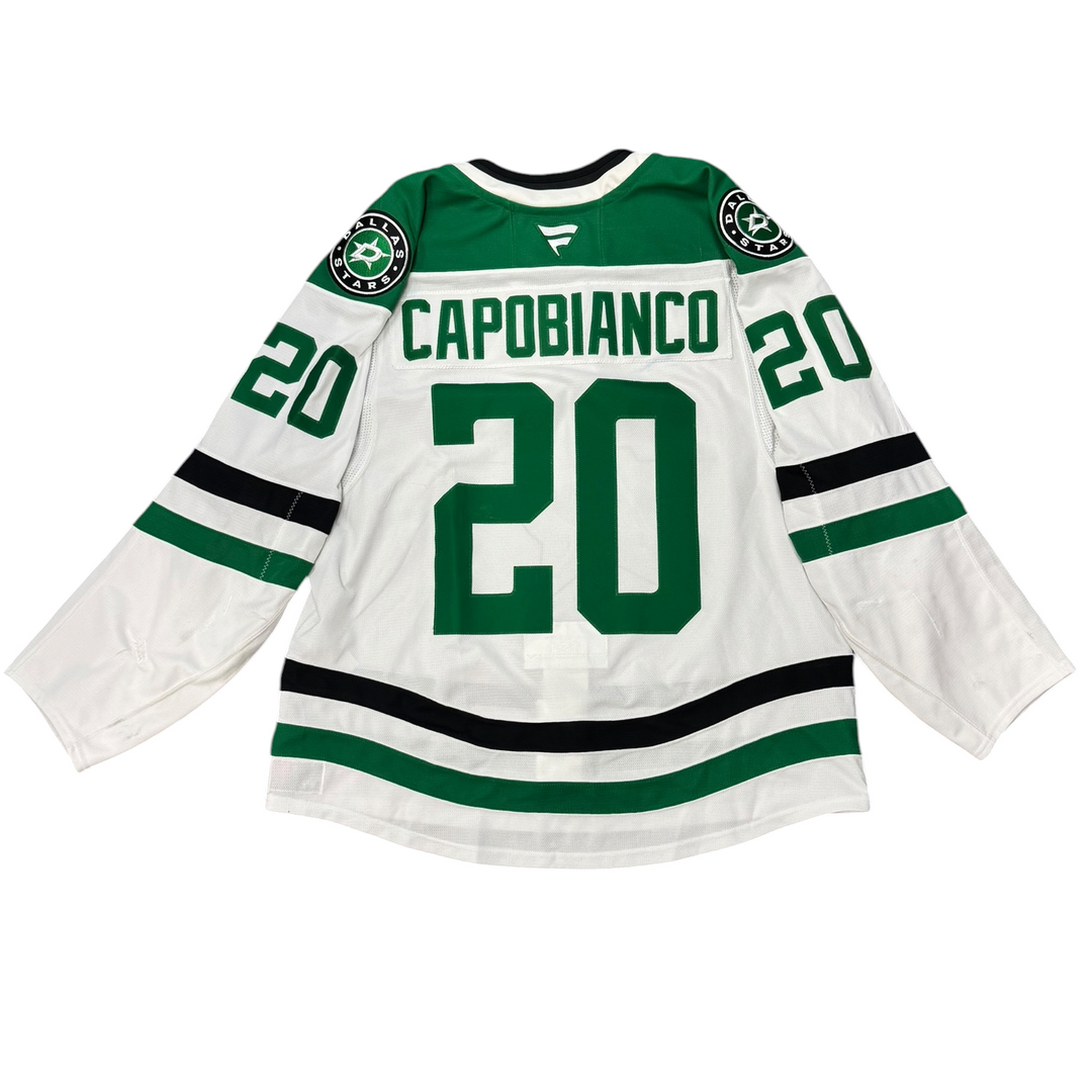 Game worn Dallas Stars away jersey with number 20 and name 'Capobianco' on a white background