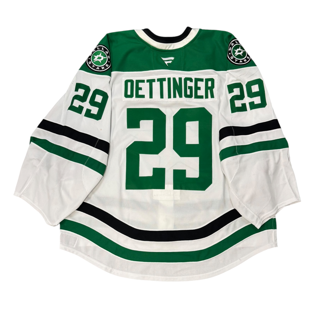 Game worn Dallas Stars away jersey with number 29 and name 'Dettinger' on a white background