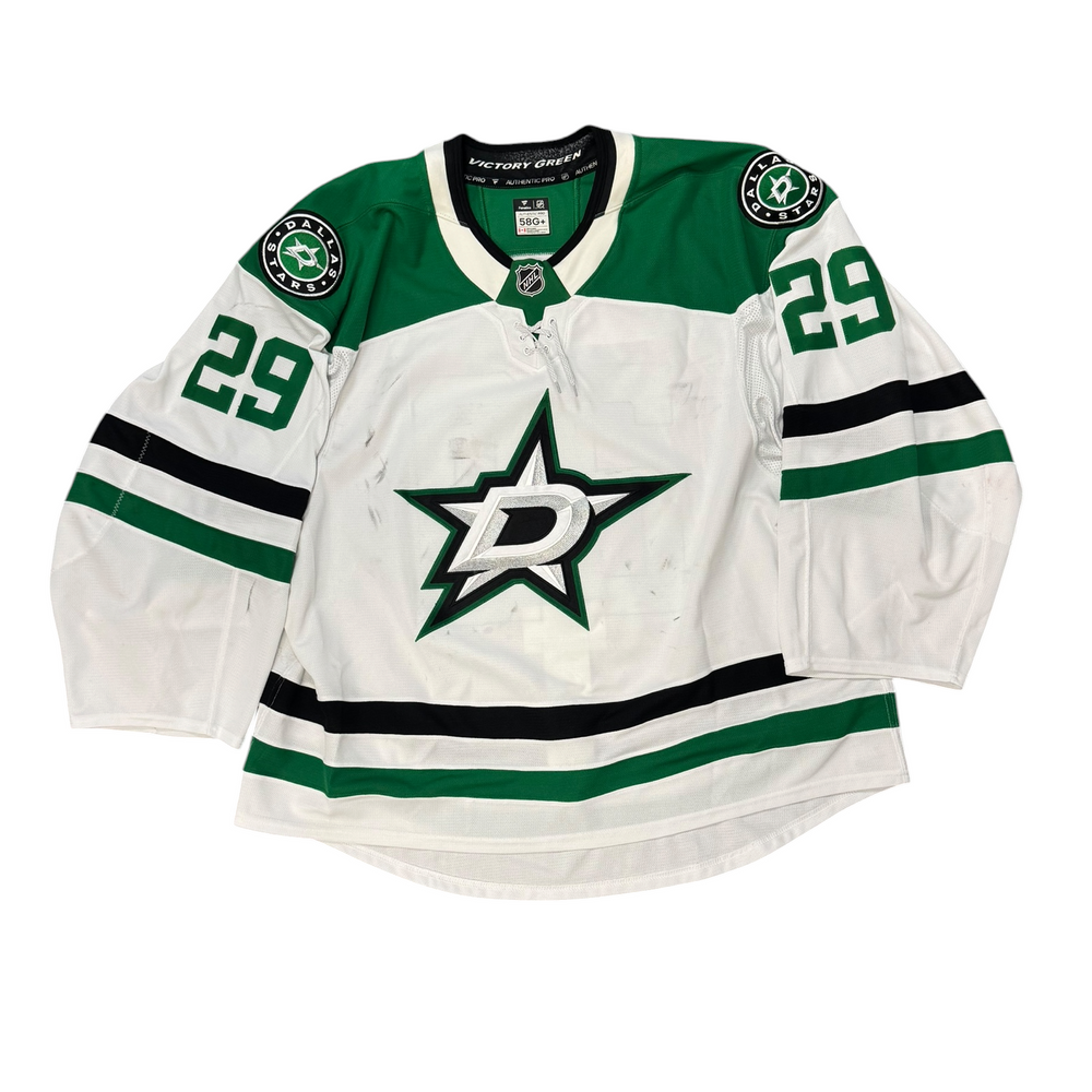 Game Worn Dallas Stars Away jersey with Stars logo on chest and number 29 on the sleeves. Jersey on a white background.