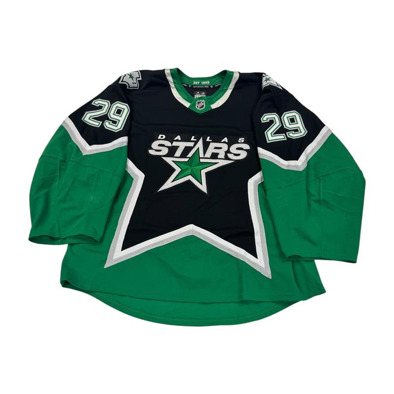 Hockey jersey with Dallas Stars logo and number 29 ON SLEEVES. Jersey on a white background