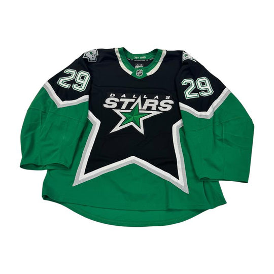 Hockey jersey with Dallas Stars logo and number 29 ON SLEEVES. Jersey on a white background